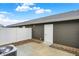 Private back patio with white fence, gravel bed, gray vinyl siding, and air conditioning unit at 19487 Grassy Branch Rd, Westfield, IN 46074