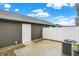 Private back patio with white fence, gravel bed, gray vinyl siding, and air conditioning unit at 19487 Grassy Branch Rd, Westfield, IN 46074