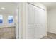 Bedroom view featuring bi-fold closet doors and neutral walls and carpet at 19487 Grassy Branch Rd, Westfield, IN 46074