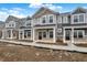 Attractive townhomes feature covered porches, stone accents, and modern exterior finishes at 19487 Grassy Branch Rd, Westfield, IN 46074