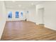 Bright living room featuring wood flooring, white trim, and plenty of natural light at 19487 Grassy Branch Rd, Westfield, IN 46074