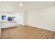 Open floorplan with kitchen, dining and living area, featuring wood floors and lots of light at 19487 Grassy Branch Rd, Westfield, IN 46074