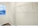 Neutral walk-in closet with window and wire rack shelving at 19487 Grassy Branch Rd, Westfield, IN 46074