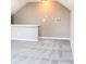Finished attic featuring neutral walls, plush carpeting, and bright lighting at 2228 Silver Rose Dr, Avon, IN 46123