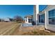 Backyard patio features a low brick retaining wall and a well-maintained lawn at 2228 Silver Rose Dr, Avon, IN 46123