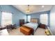 Comfortable bedroom featuring large windows and stylish furnishings creating a cozy retreat at 2228 Silver Rose Dr, Avon, IN 46123
