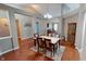 Spacious dining room with hardwood floors, neutral paint, and plenty of natural light at 2228 Silver Rose Dr, Avon, IN 46123