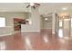 Open living area with hardwood floors, seamlessly connecting to the kitchen and dining at 2228 Silver Rose Dr, Avon, IN 46123