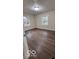Bedroom with neutral walls, hardwood floors, and windows at 229 Hillendale Dr, Greenwood, IN 46142