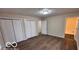 Bedroom featuring wood floors, neutral paint and an ensuite bath at 229 Hillendale Dr, Greenwood, IN 46142
