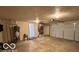 Spacious garage with ample room for parking and storage, plus easy access to utilities like the water heater at 229 Hillendale Dr, Greenwood, IN 46142