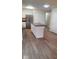 Modern kitchen featuring stainless steel appliances, a center island, and white cabinets for maximum storage at 229 Hillendale Dr, Greenwood, IN 46142