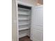 A pantry in the kitchen that features multiple shelves, providing ample storage for groceries and kitchen essentials at 229 Hillendale Dr, Greenwood, IN 46142