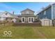 Spacious backyard featuring a large deck and outdoor workout equipment at 234 N State Ave, Indianapolis, IN 46201