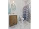 A well designed bathroom featuring modern fixtures, stylish tile, and a walk-in shower at 234 N State Ave, Indianapolis, IN 46201