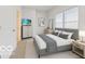 Serene bedroom with neutral tones, comfortable bed, and plenty of natural light at 234 N State Ave, Indianapolis, IN 46201