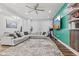 Bright and airy living room with large sectional, hardwood floors, and modern decor at 234 N State Ave, Indianapolis, IN 46201