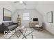 Bright office with a modern desk, comfortable couch, and stylish decor at 234 N State Ave, Indianapolis, IN 46201