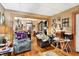 Warm living room featuring hardwood floors, ample lighting, and an inviting atmosphere for relaxation at 3329 W 10Th St, Indianapolis, IN 46222
