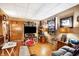 Warm living room featuring hardwood floors, ample lighting, and an inviting atmosphere for relaxation at 3329 W 10Th St, Indianapolis, IN 46222