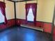 Bedroom with red trim and a window at 338 A St, Wilkinson, IN 46186