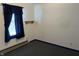 Simple bedroom with blue trim and dark carpet at 338 A St, Wilkinson, IN 46186