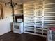 Kitchen featuring new white oven, tiled floor, large shelving, and laminate countertops at 338 A St, Wilkinson, IN 46186