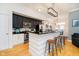 Well-equipped kitchen with stainless steel appliances and bar stool seating at 355 E Ohio St # 116, Indianapolis, IN 46204