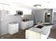 Bright kitchen featuring white cabinets, granite countertops, stainless steel microwave, and modern lighting at 401 W Edwards Ave, Indianapolis, IN 46217