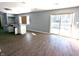 Open floor plan featuring new floors, sliding glass doors and a renovated kitchen at 401 W Edwards Ave, Indianapolis, IN 46217