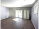 Open floor plan featuring new floors, sliding glass doors and neutral paint at 401 W Edwards Ave, Indianapolis, IN 46217