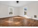 This bedroom features hardwood floors and two windows at 422 E Main St, Lebanon, IN 46052