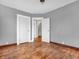 Bedroom with hardwood floors, neutral paint, and lots of natural light at 422 E Main St, Lebanon, IN 46052