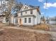 Charming two-story home featuring a bright orange door, classic architecture, and inviting curb appeal at 422 E Main St, Lebanon, IN 46052