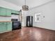 Bright kitchen with modern appliances, butcher block countertops, and an industrial-style light fixture at 422 E Main St, Lebanon, IN 46052