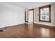 Bright living room featuring hardwood floors, shiplap accent wall, and natural light at 422 E Main St, Lebanon, IN 46052