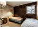Cozy bedroom with natural light, featuring two beds and a cork accent wall at 426 Oakwood Dr, Indianapolis, IN 46260