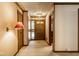 Welcoming foyer with carpet, front door, and decorative lighting at 426 Oakwood Dr, Indianapolis, IN 46260
