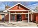 Inviting home entrance with covered porch, brick columns, and stylish front door at 426 Oakwood Dr, Indianapolis, IN 46260