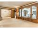 Expansive living room featuring a large window and adjoining rooms at 426 Oakwood Dr, Indianapolis, IN 46260
