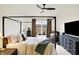 Bedroom with a canopy bed, ceiling fan and lots of natural light at 4425 Maize Ln, Whitestown, IN 46075