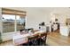 Dining area with a view of the backyard through large window with lots of natural light at 4425 Maize Ln, Whitestown, IN 46075