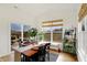 Bright dining area with lots of seating and natural light at 4425 Maize Ln, Whitestown, IN 46075