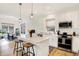 Well-lit kitchen with stainless steel appliances, a center island, and plenty of counter space at 4425 Maize Ln, Whitestown, IN 46075