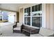 View of the covered porch with chairs and a small table, showcasing a relaxing outdoor space at 4425 Maize Ln, Whitestown, IN 46075