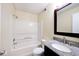 Full bathroom showcasing a shower-tub combo and granite vanity at 4438 Fullwood Ct, Indianapolis, IN 46254