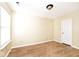 Neutral bedroom with a large window and updated vinyl plank flooring at 4438 Fullwood Ct, Indianapolis, IN 46254