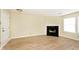 Inviting living room with a black fireplace and natural light at 4438 Fullwood Ct, Indianapolis, IN 46254