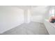 Spacious bedroom with white walls, plush carpeting, and comfortable window seating at 4981 E County Road 200 S, Avon, IN 46123