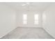 Neutral-colored bedroom with natural lighting and plush carpeting at 4981 E County Road 200 S, Avon, IN 46123